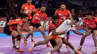 Surinder Singh (centre, tackling)